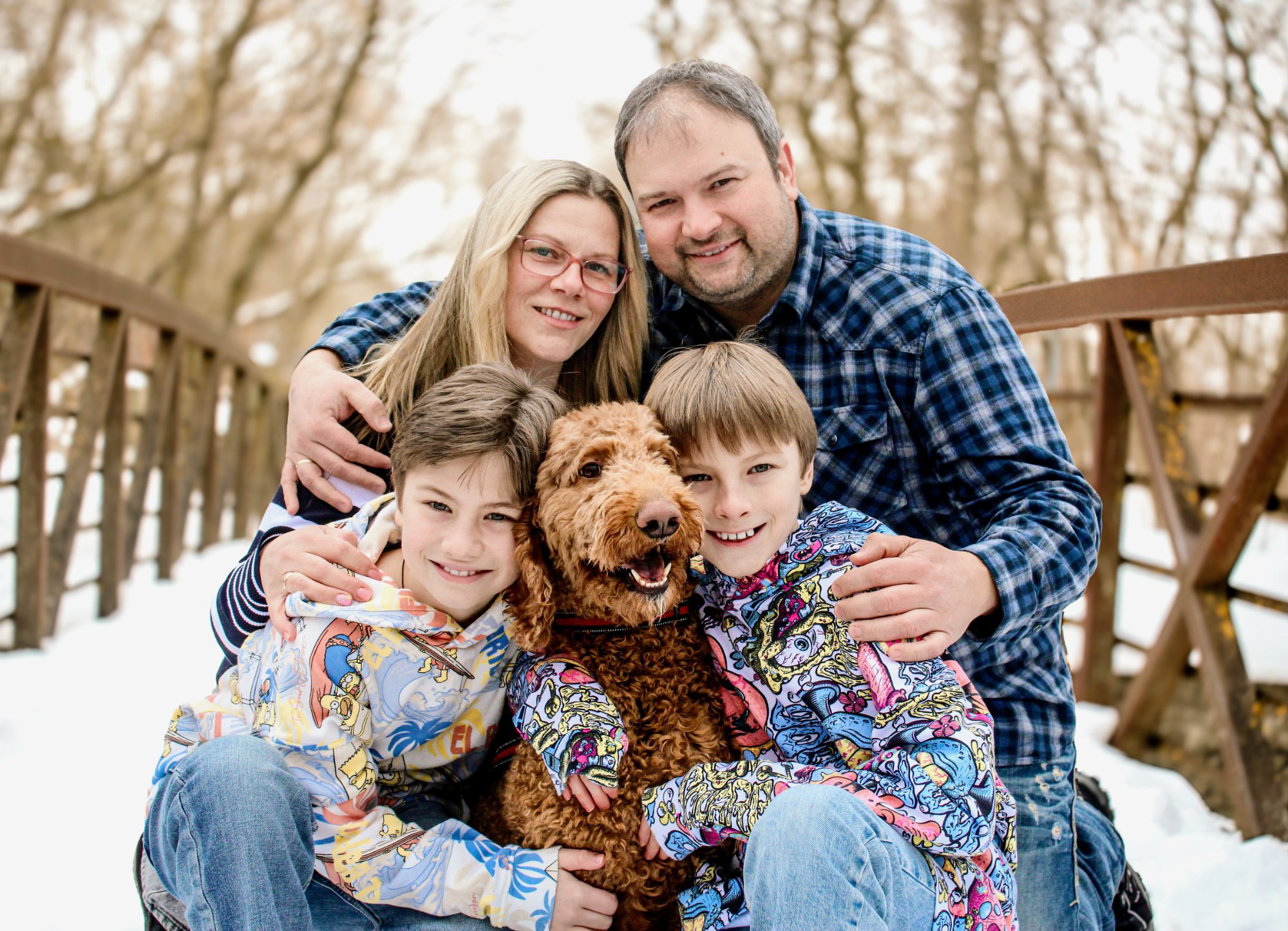 Family portrait with dog in winter in Elmira, Ontario