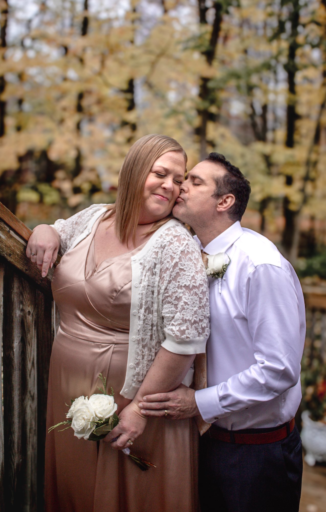 Wedding kiss in autumn forest - wedding photography in Elmira, Ontario